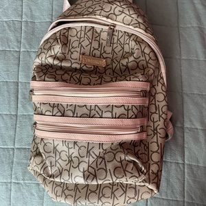 Calvin Klein crème and pink backpack with extraordinary storage space